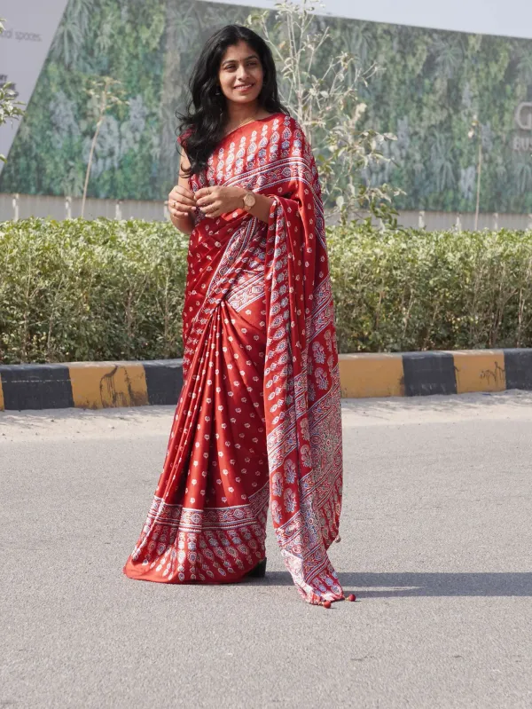 Elegant_Red_Satin_Silk_Saree_with_Designer_Prints_&_Handmade_Tassels_–_Timeless_Elegance
