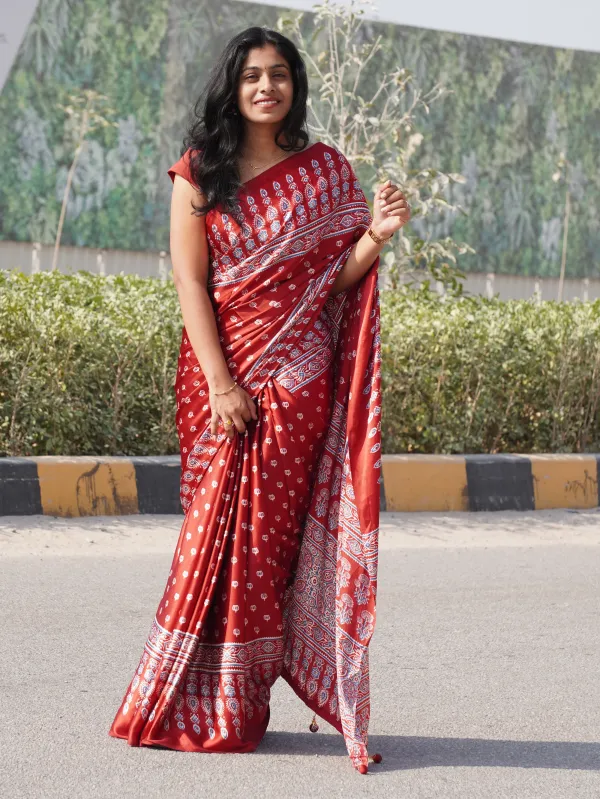 Elegant_Red_Satin_Silk_Saree_with_Designer_Prints_&_Handmade_Tassels_–_Timeless_Elegance