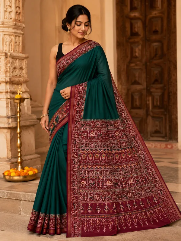 Traditional_Patola_Border_Saree_with_Plain_Body_Dola_Silk_Saree_-_Green