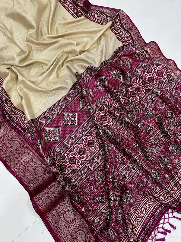 TRADITIONAL_CREAM_AND_WINE_COLOR_WITH_BEAUTIFULL_GOLDEN_WEVING_SAREE_WITH_LESS_BORDER