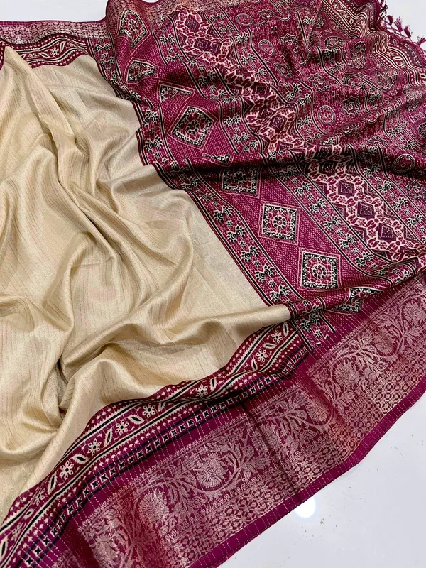 TRADITIONAL_CREAM_AND_WINE_COLOR_WITH_BEAUTIFULL_GOLDEN_WEVING_SAREE_WITH_LESS_BORDER