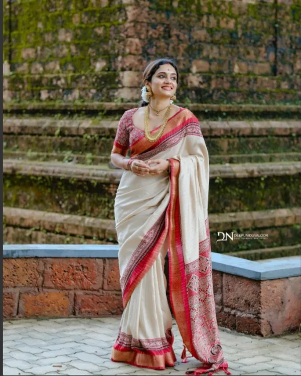 Traditional_Cream_and_Maroon_Saree_with_Elegant_Golden_Weaving_and_Subtle_Border