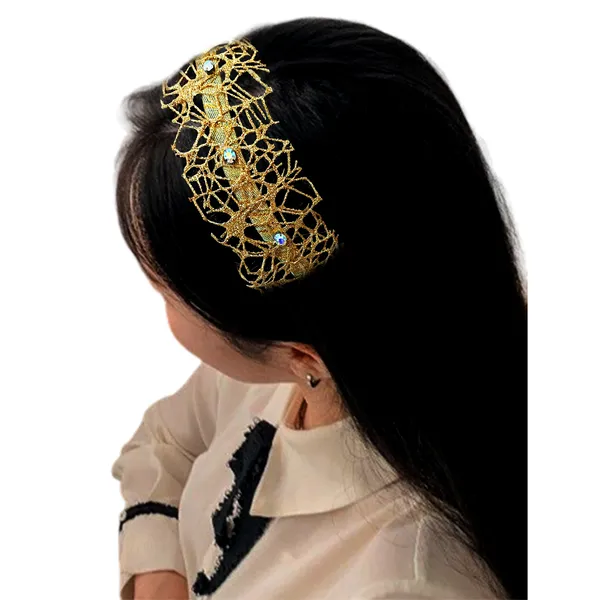 Elegant_ribbon-wrapped_hairband_featuring_shimmering_net_fabric_and_a_crystal_nag_adornment,_adding_sparkle_and_sophistication_to_your_hairstyle.