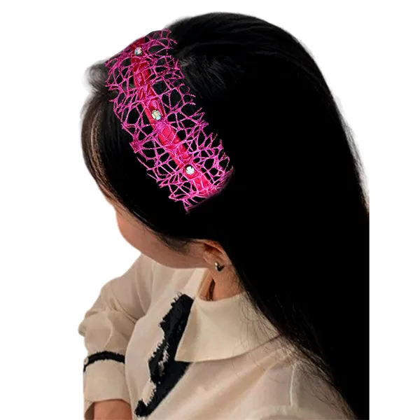 Elegant_ribbon-wrapped_hairband_featuring_shimmering_net_fabric_and_a_crystal_nag_adornment,_adding_sparkle_and_sophistication_to_your_hairstyle.
