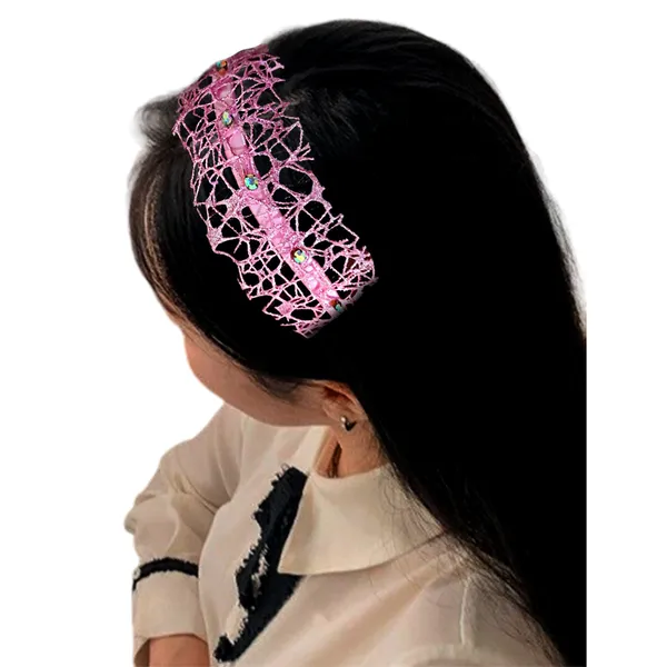 Elegant_ribbon-wrapped_hairband_featuring_shimmering_net_fabric_and_a_crystal_nag_adornment,_adding_sparkle_and_sophistication_to_your_hairstyle.