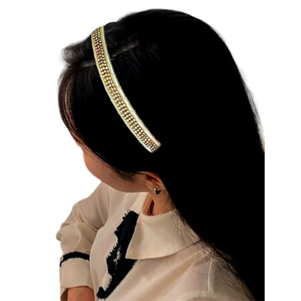 "Elegant_Ribbon-Covered_Hair_Band_with_Crystal_Nag_Chain_Adornment_and_Black_Ribbon_Ends_for_a_Chic,_Stylish_Look"