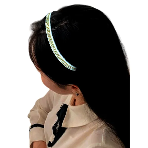 "Elegant_Ribbon-Covered_Hair_Band_with_Crystal_Nag_Chain_Adornment_and_Black_Ribbon_Ends_for_a_Chic,_Stylish_Look"