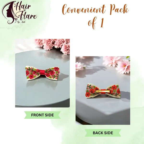 A_floral-printed_hair_bow_with_secure_clip_on_the_back_for_easy_attachment_and_stylish,_lasting_wear.