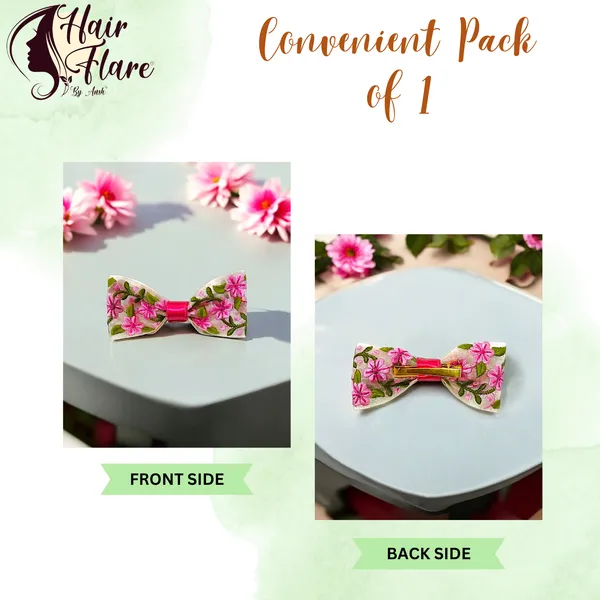 A_floral-printed_hair_bow_with_secure_clip_on_the_back_for_easy_attachment_and_stylish,_lasting_wear.