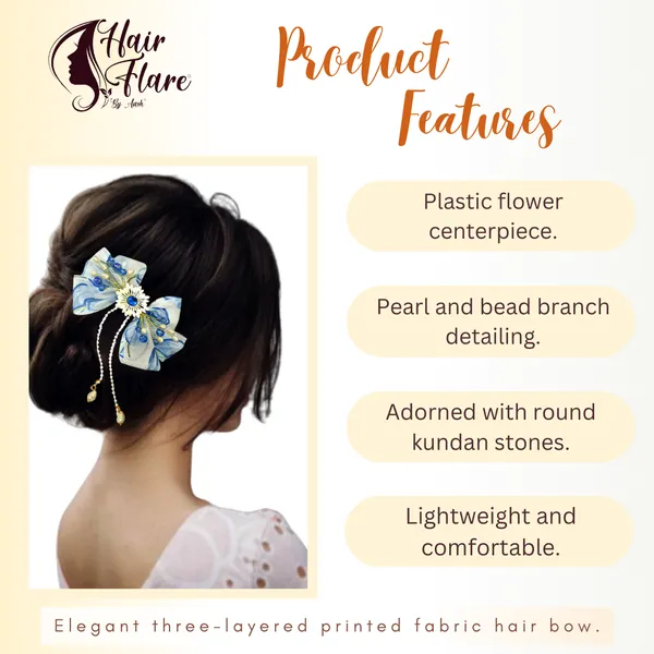 Elegant_three-layered_fabric_hair_bow_with_plastic_flower,_kundan_adornment,_pearl_and_bead_branches,_and_golden_clip_attachment.