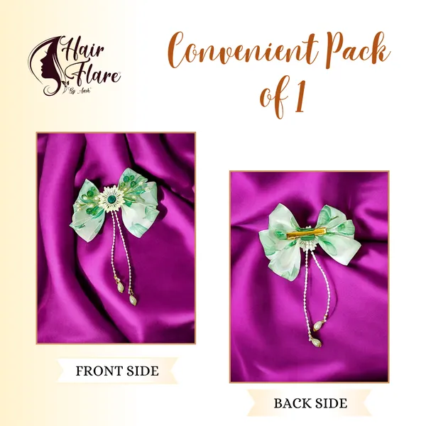 Elegant_three-layered_fabric_hair_bow_with_plastic_flower,_kundan_adornment,_pearl_and_bead_branches,_and_golden_clip_attachment.