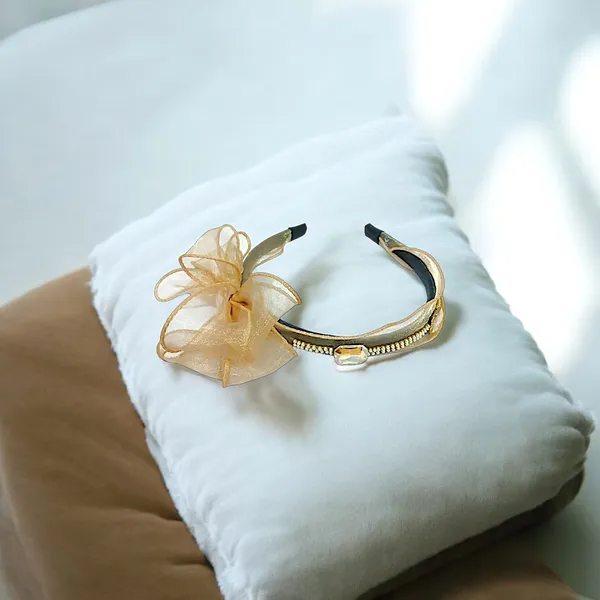 Elegant_Black_Ribbon_Hairband_with_Pearl_Bead_Chain,_Crystal_Adornments,_and_Beautiful_Ribbon_Flower_for_a_Chic_Look