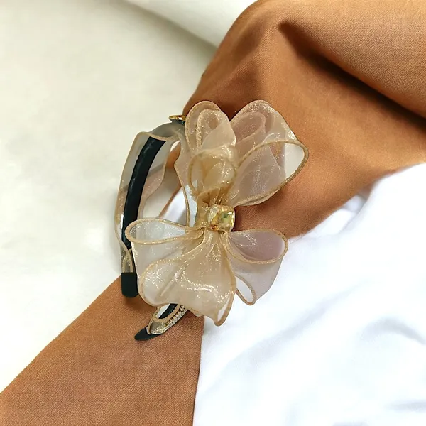 Elegant_Black_Ribbon_Hairband_with_Pearl_Bead_Chain,_Crystal_Adornments,_and_Beautiful_Ribbon_Flower_for_a_Chic_Look