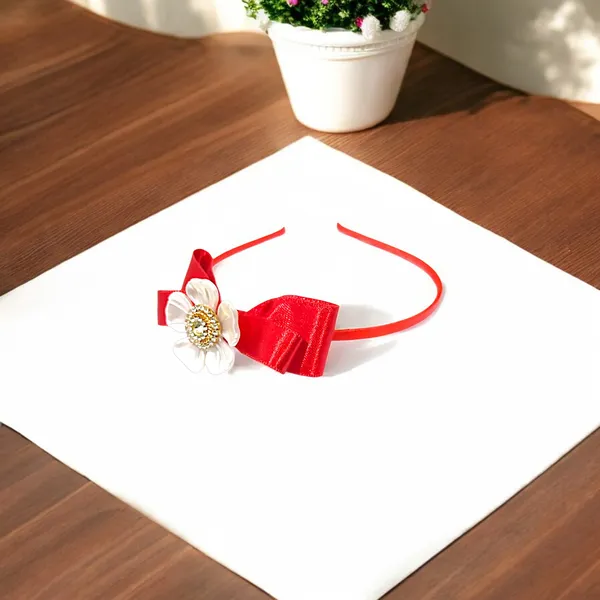 Elevate_your_style_with_our_elegant_hairband,_featuring_a_chic_bow,_stunning_pearl_flower,_and_sparkling_nag_crystals._Lightweight_and_comfortable,_it's_perfect_for_any_occasion_and_suitable_for_all_ages.