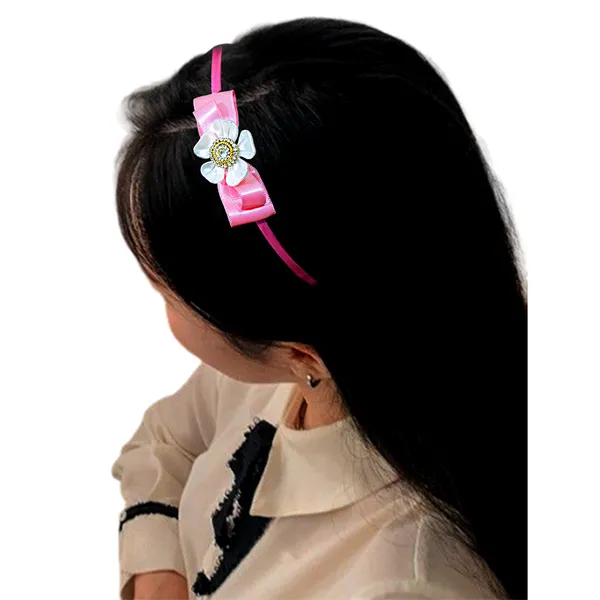 Elevate_your_style_with_our_elegant_hairband,_featuring_a_chic_bow,_stunning_pearl_flower,_and_sparkling_nag_crystals._Lightweight_and_comfortable,_it's_perfect_for_any_occasion_and_suitable_for_all_ages.