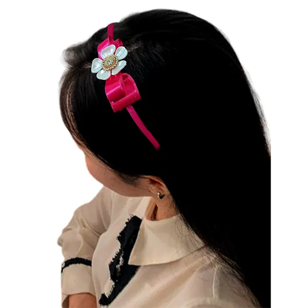 Elevate_your_style_with_our_elegant_hairband,_featuring_a_chic_bow,_stunning_pearl_flower,_and_sparkling_nag_crystals._Lightweight_and_comfortable,_it's_perfect_for_any_occasion_and_suitable_for_all_ages.