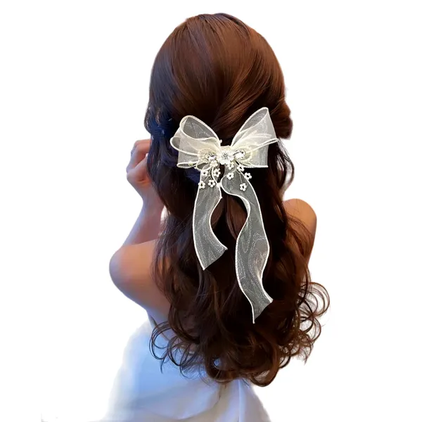 Glamorous_Touch:_Cream_Bow_with_Sparkling_Crystals.