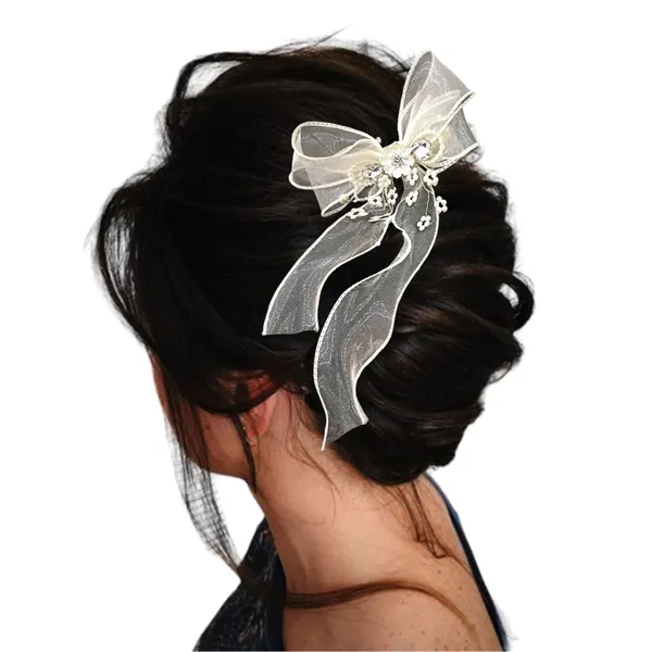 Glamorous_Touch:_Cream_Bow_with_Sparkling_Crystals.