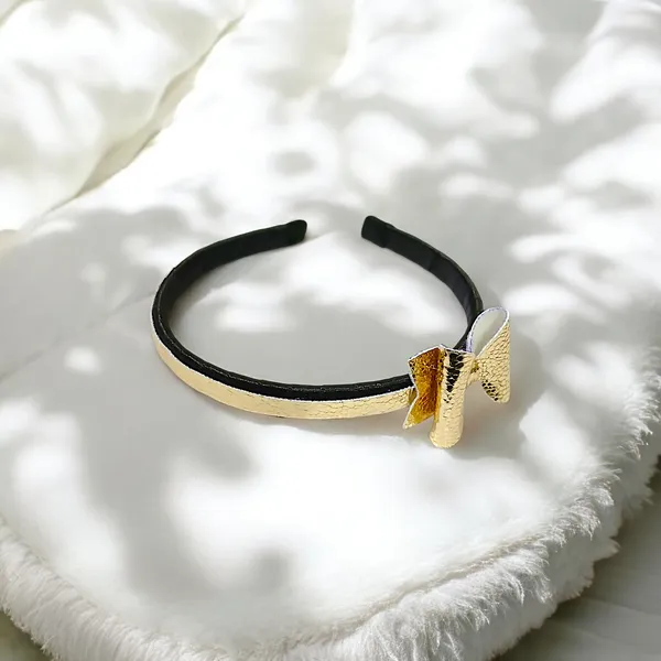 Playful_Sophistication:_Golden_Rexine_Bow_Hair_Band.
