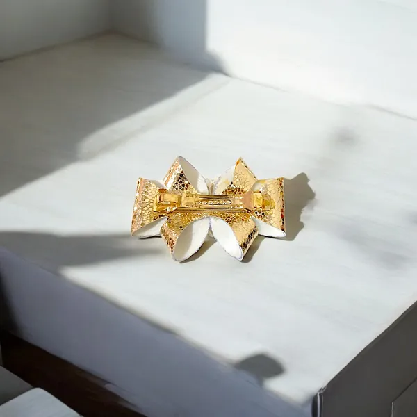 Timeless_Charm:_Pearl-Embellished_Golden_Hair_Bow.