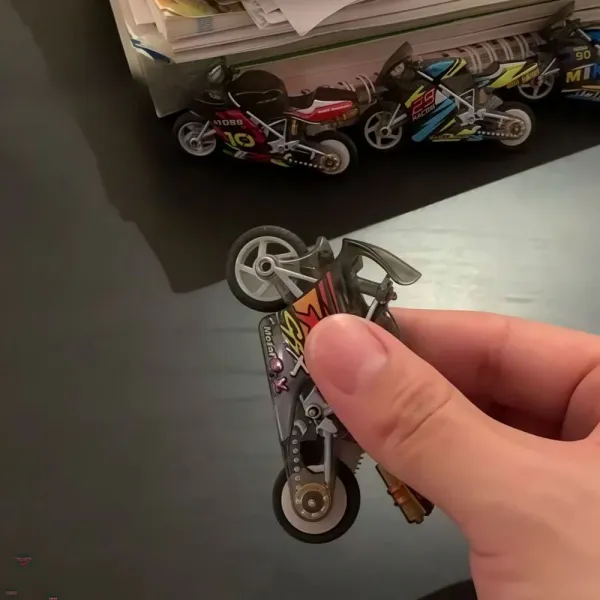 Buy_1_Get_2_Sparking_Stunt_Toy_Bike_(Choose_From_Drop_Down_Menu)_-_Random_Bikes_will_be_Provided.