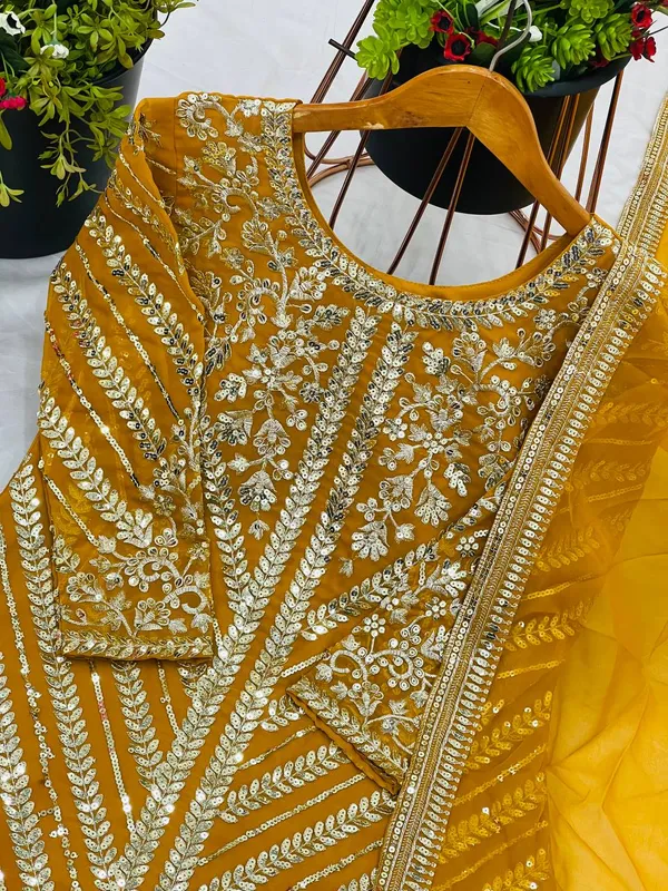 Mustard_Heavy_Faux_Georgette_Sequence_Embroidered_Sharara_Salwar_Suit_With_Dupatta