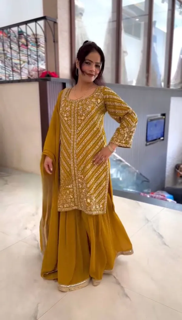 Mustard_Heavy_Faux_Georgette_Sequence_Embroidered_Sharara_Salwar_Suit_With_Dupatta
