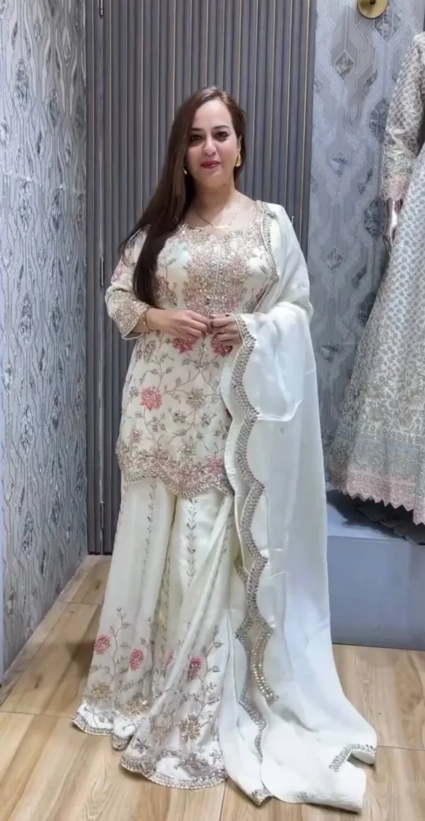 WHITE_ELEGANT_CHINNON_SILK_SEQUENCE_EMBROIDERED_SHARARA_SALWAR_SUIT_WITH_DUPATTA