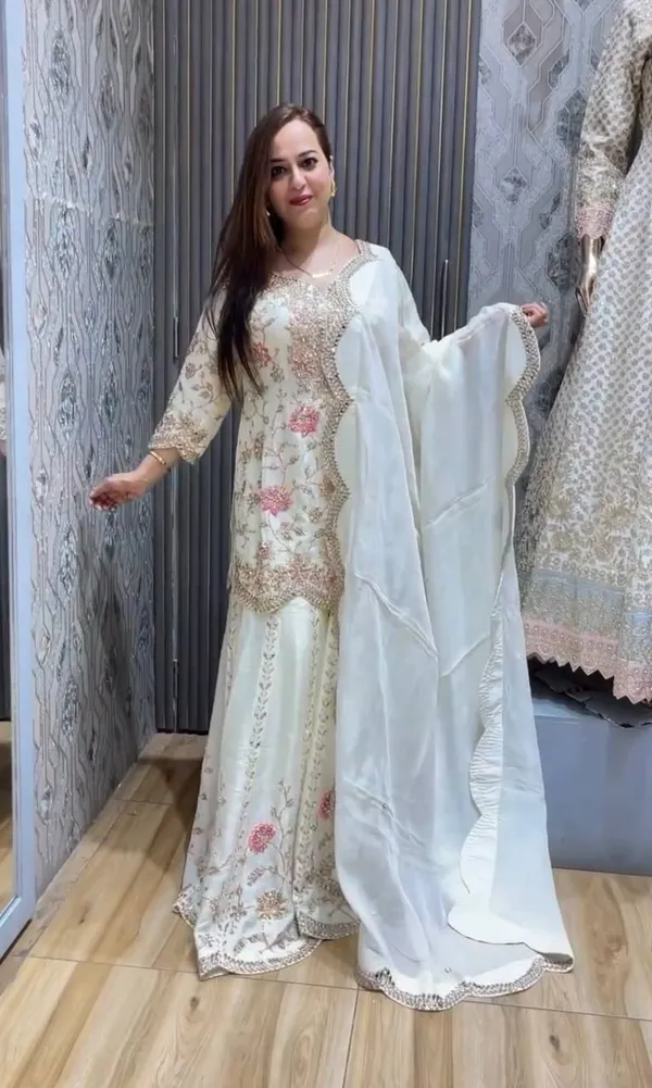 WHITE_ELEGANT_CHINNON_SILK_SEQUENCE_EMBROIDERED_SHARARA_SALWAR_SUIT_WITH_DUPATTA
