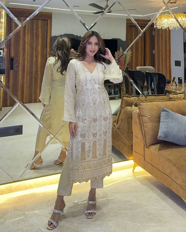 WHITE_FANCY_FAUX_GEORGETTE_SEQUENCE_EMBROIDERED_WORK_SALWAR_SUIT_WITH_DUPATTA
