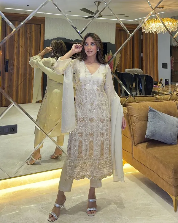 WHITE_FANCY_FAUX_GEORGETTE_SEQUENCE_EMBROIDERED_WORK_SALWAR_SUIT_WITH_DUPATTA