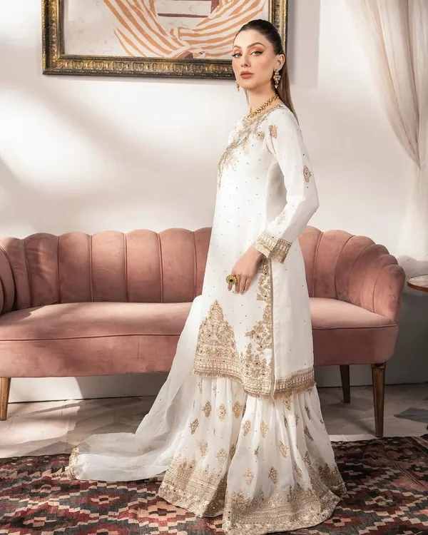 WHITE_FAUX_GEORGETTE_HEAVY_SEQUENCE_EMBROIDERED_SHARARA_SALWAR_SUIT_WITH_DUPATTA