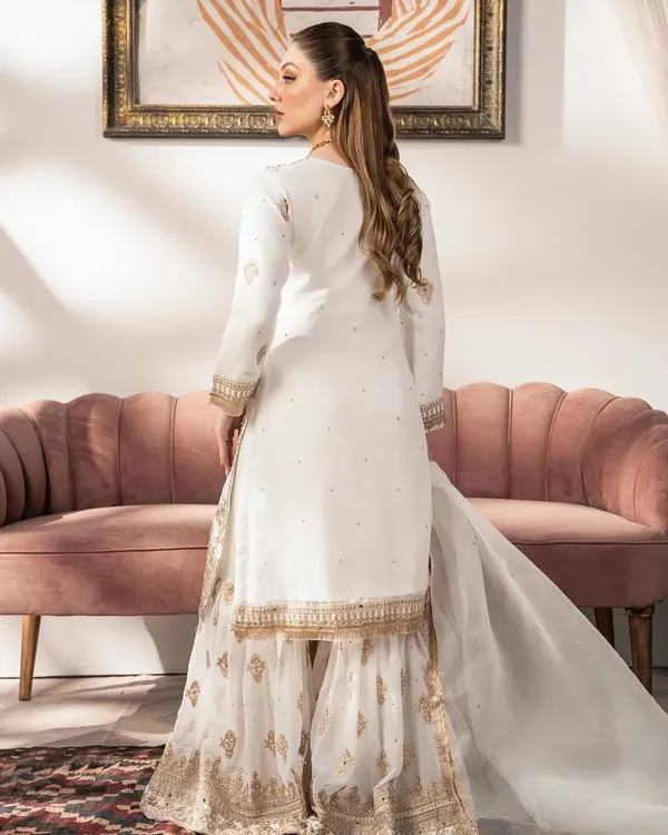 WHITE_FAUX_GEORGETTE_HEAVY_SEQUENCE_EMBROIDERED_SHARARA_SALWAR_SUIT_WITH_DUPATTA