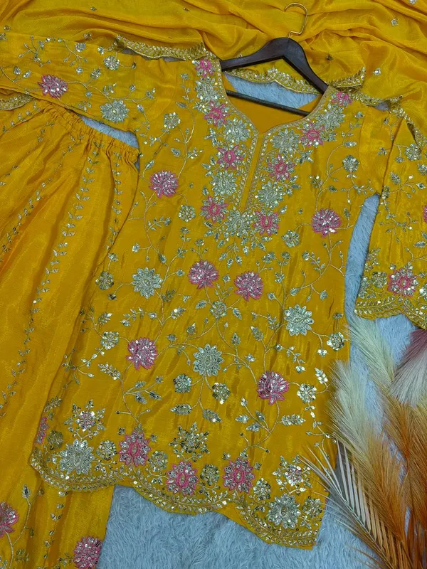 YELLOW_ELEGANT_CHINNON_SILK_SEQUENCE_EMBROIDERED_SHARARA_SALWAR_SUIT_WITH_DUPATTA