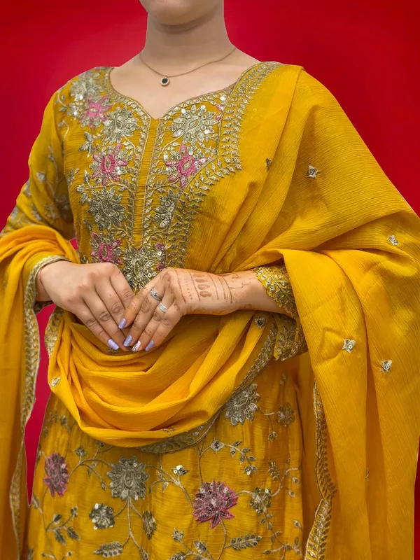YELLOW_ELEGANT_CHINNON_SILK_SEQUENCE_EMBROIDERED_SHARARA_SALWAR_SUIT_WITH_DUPATTA