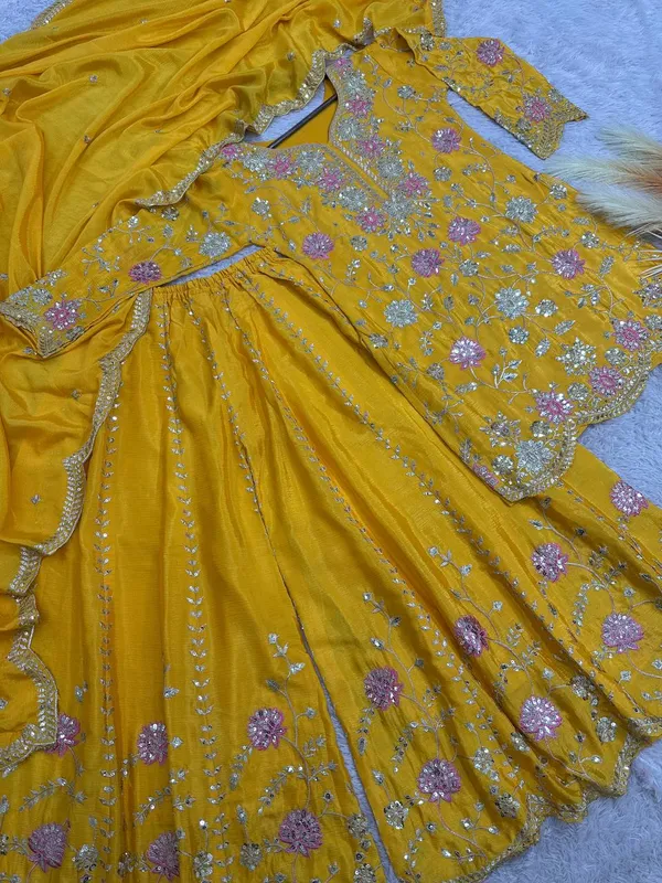 YELLOW_ELEGANT_CHINNON_SILK_SEQUENCE_EMBROIDERED_SHARARA_SALWAR_SUIT_WITH_DUPATTA