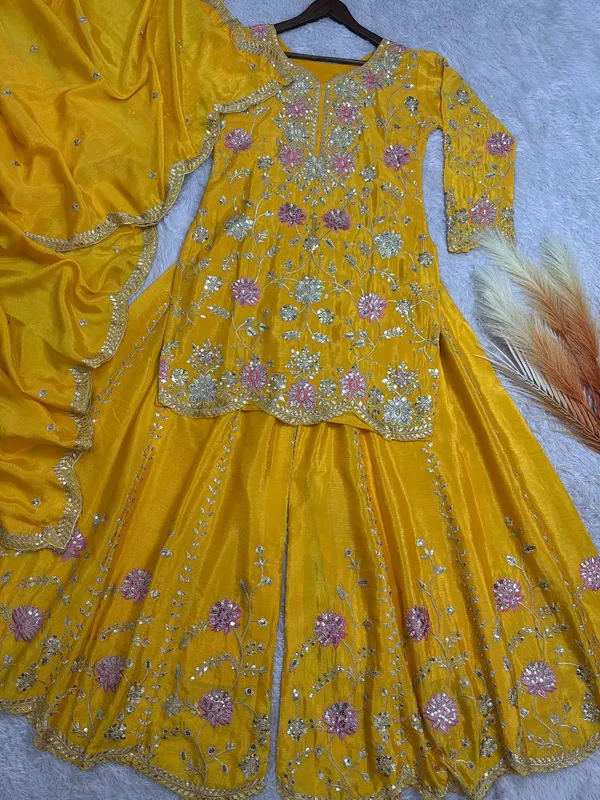 YELLOW_ELEGANT_CHINNON_SILK_SEQUENCE_EMBROIDERED_SHARARA_SALWAR_SUIT_WITH_DUPATTA