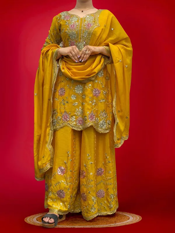 YELLOW_ELEGANT_CHINNON_SILK_SEQUENCE_EMBROIDERED_SHARARA_SALWAR_SUIT_WITH_DUPATTA