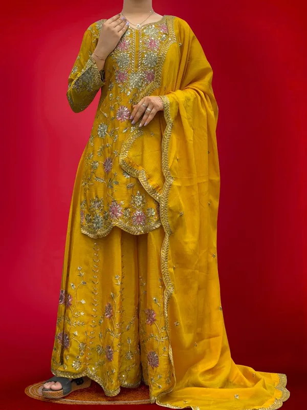 YELLOW_ELEGANT_CHINNON_SILK_SEQUENCE_EMBROIDERED_SHARARA_SALWAR_SUIT_WITH_DUPATTA