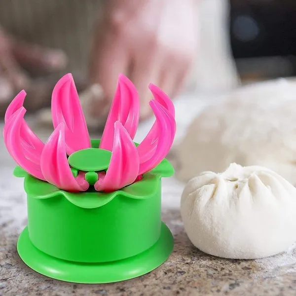 plastic_Momos_Dumpling_Maker_Dough_Press_Mould_Shapes_(Pink_and_Green,_Pack_of_1)