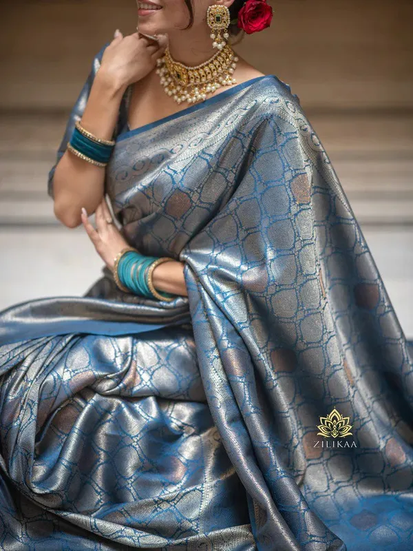 Exquisite_Sky_Blue_Banarasi_Silk_Saree_with_Intricate_Silver_Patterns_and_Traditional_Motifs
