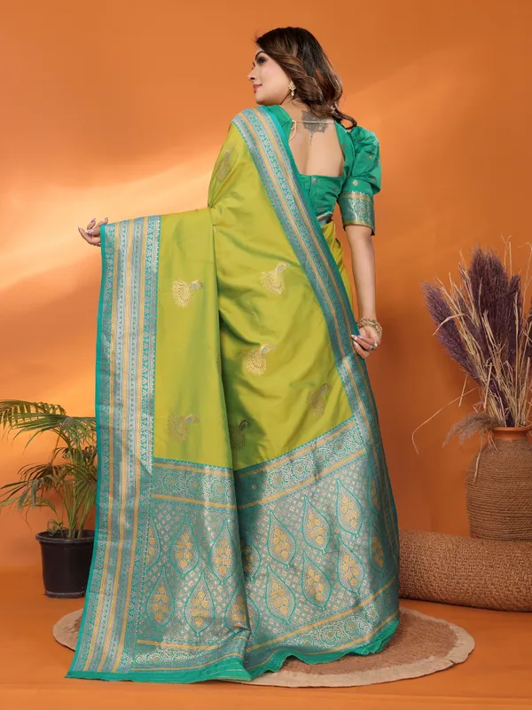 Pista_Green_Banarasi_Silk_Saree_with_Contrast_Blue_Zari_Border_and_Traditional_Motifs
