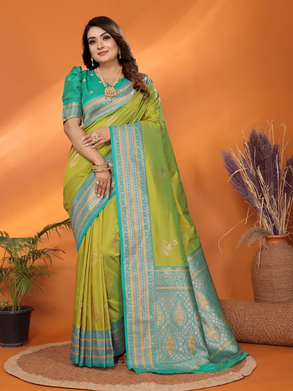 Pista_Green_Banarasi_Silk_Saree_with_Contrast_Blue_Zari_Border_and_Traditional_Motifs