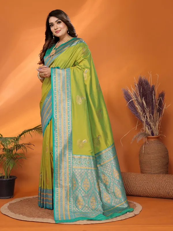 Pista_Green_Banarasi_Silk_Saree_with_Contrast_Blue_Zari_Border_and_Traditional_Motifs