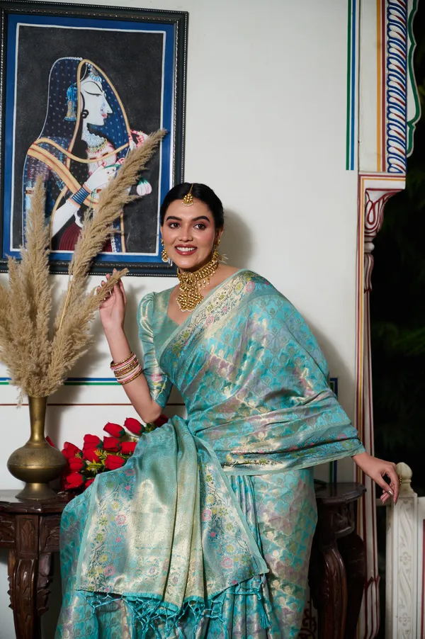 Aqua_Blue_Banarasi_Organza_Saree_With_Tassels_Blouse_For_Women