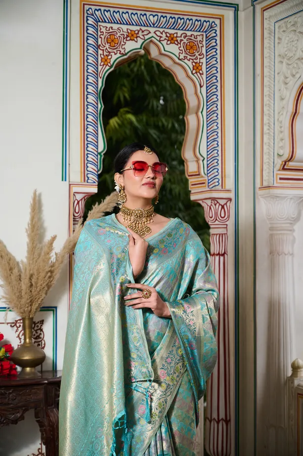 Aqua_Blue_Banarasi_Organza_Saree_With_Tassels_Blouse_For_Women