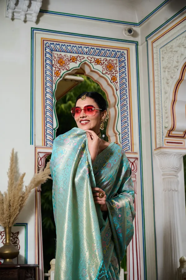 Aqua_Blue_Banarasi_Organza_Saree_With_Tassels_Blouse_For_Women