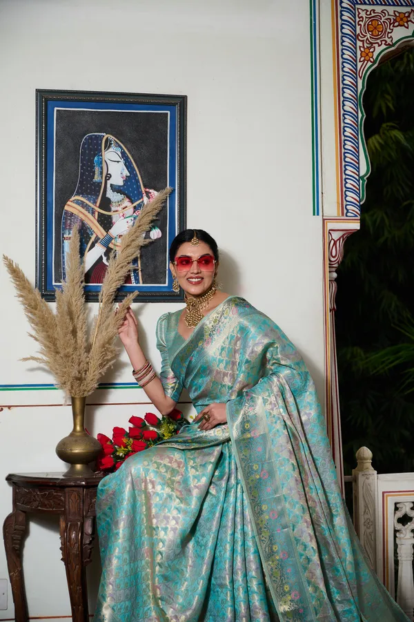 Aqua_Blue_Banarasi_Organza_Saree_With_Tassels_Blouse_For_Women