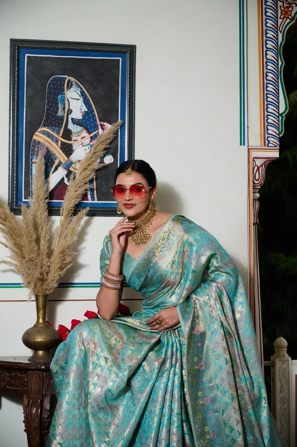 Aqua_Blue_Banarasi_Organza_Saree_With_Tassels_Blouse_For_Women