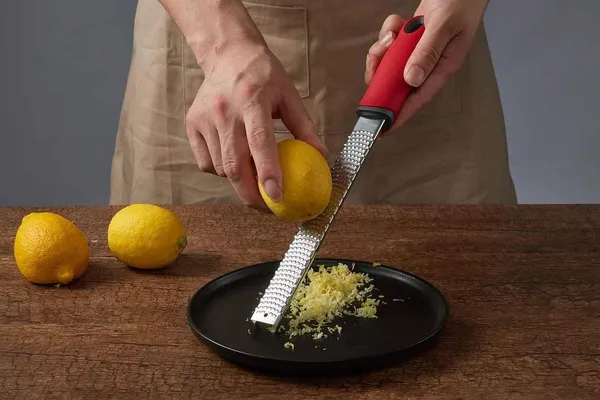 Stainless_Steel_Lemon_Long_Zester_And_Cheese_Grater_(Red)
